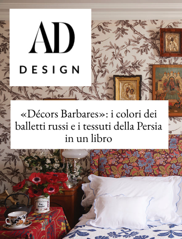 Decorative interior with floral wallpaper and colorful textiles, featuring the 'AD Design' logo from the Décors Barbares article