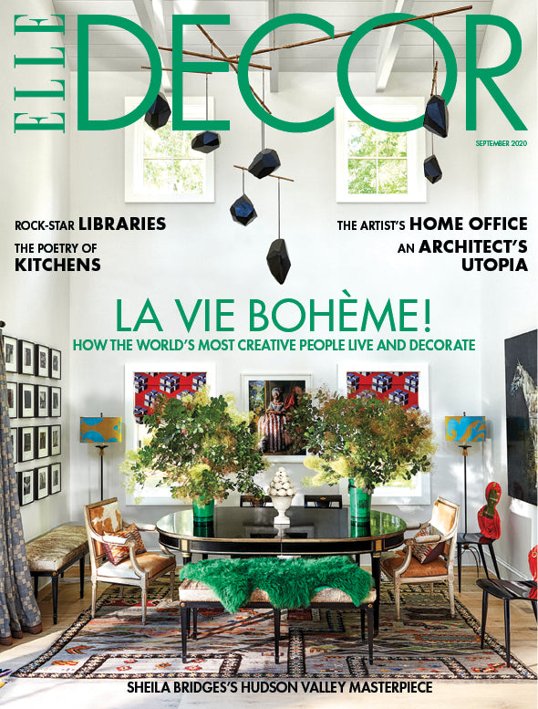 Cover of Elle Decor magazine featuring a decorated room with furniture and decor elements.